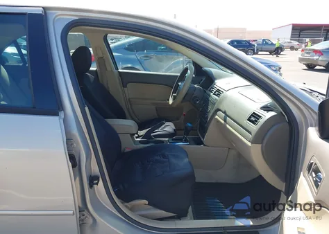 2009 Ford Fusion Se z USA, uszkodzony, nr VIN 3FAHP07159R219228